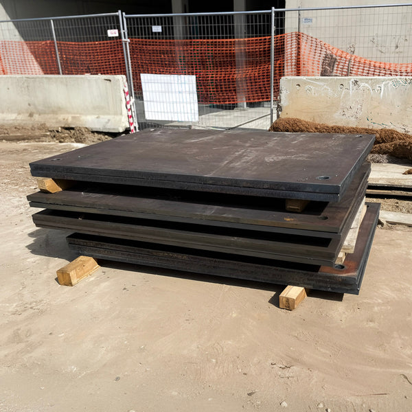 Steel road plates delivered to construction site